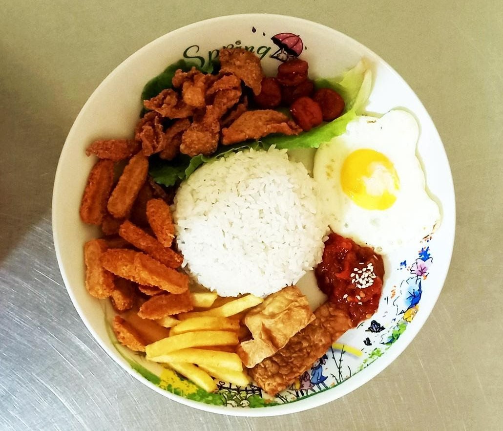 Wajib Coba! Enaknya Nasi Kulit Abang Jago