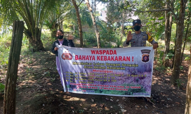 Bhabinkamtibmas Sosialisasikan Larangan Membakar Hutan dan Lahan